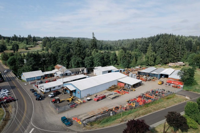 Aerial view of the Fischer Mill Supply dealership, service center, and equipment yard in Oregon City, Oregon